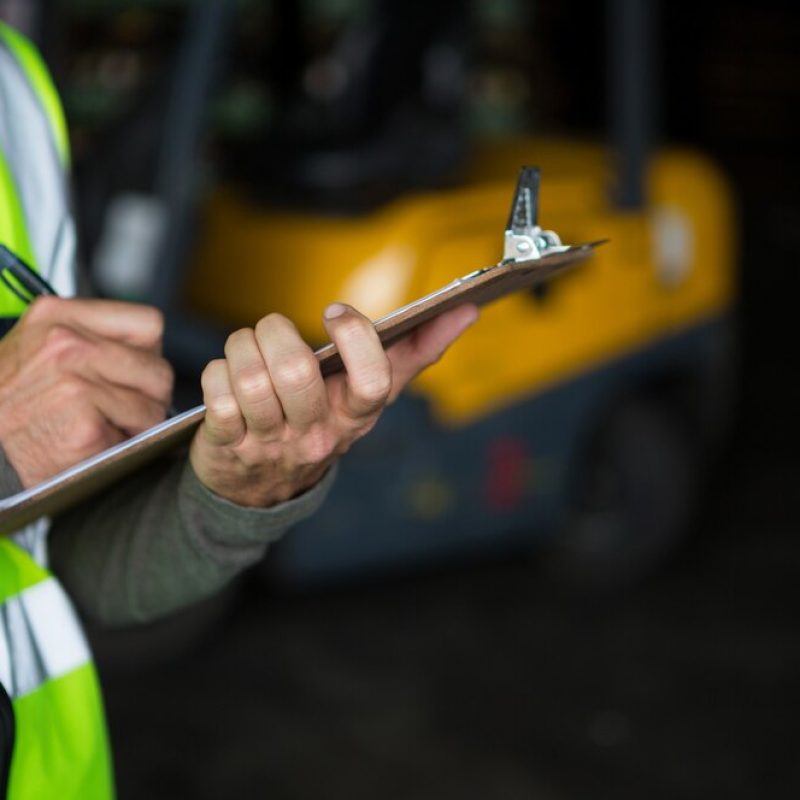 male-worker-writing-clipboard_107420-96032